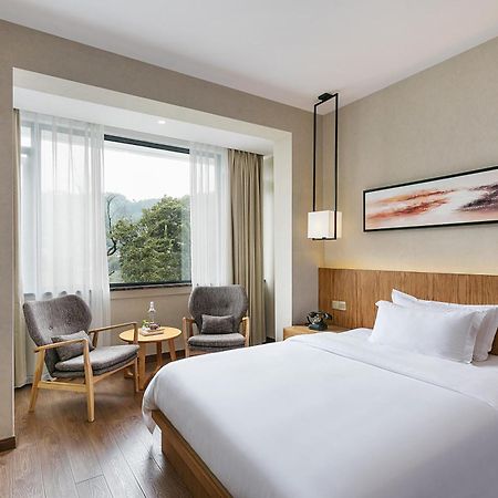 Hangzhou Puyu Travelling With Hotel Zewnętrze zdjęcie