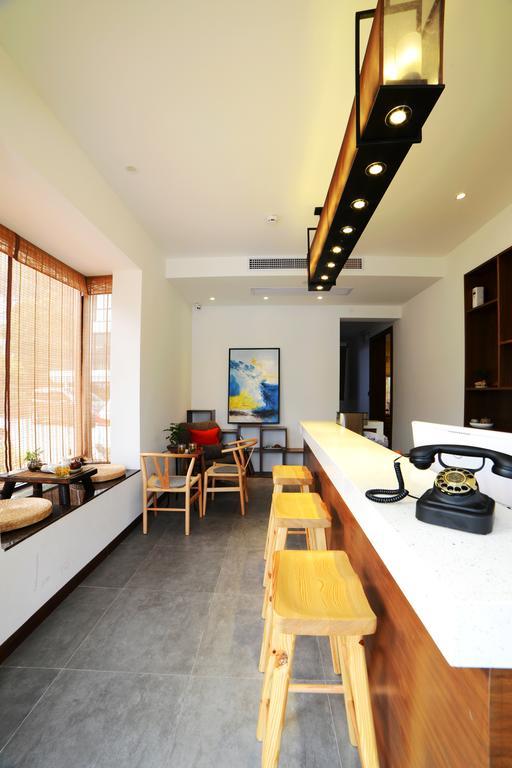 Hangzhou Puyu Travelling With Hotel Zewnętrze zdjęcie