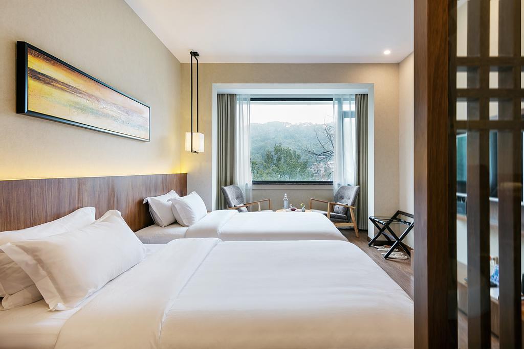 Hangzhou Puyu Travelling With Hotel Zewnętrze zdjęcie
