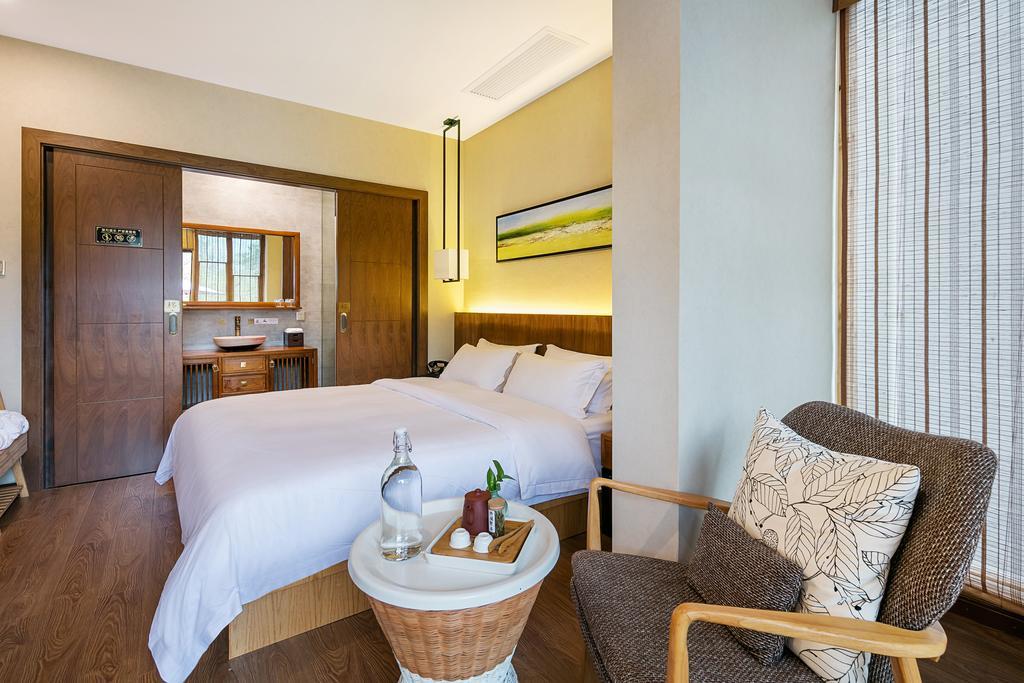 Hangzhou Puyu Travelling With Hotel Zewnętrze zdjęcie