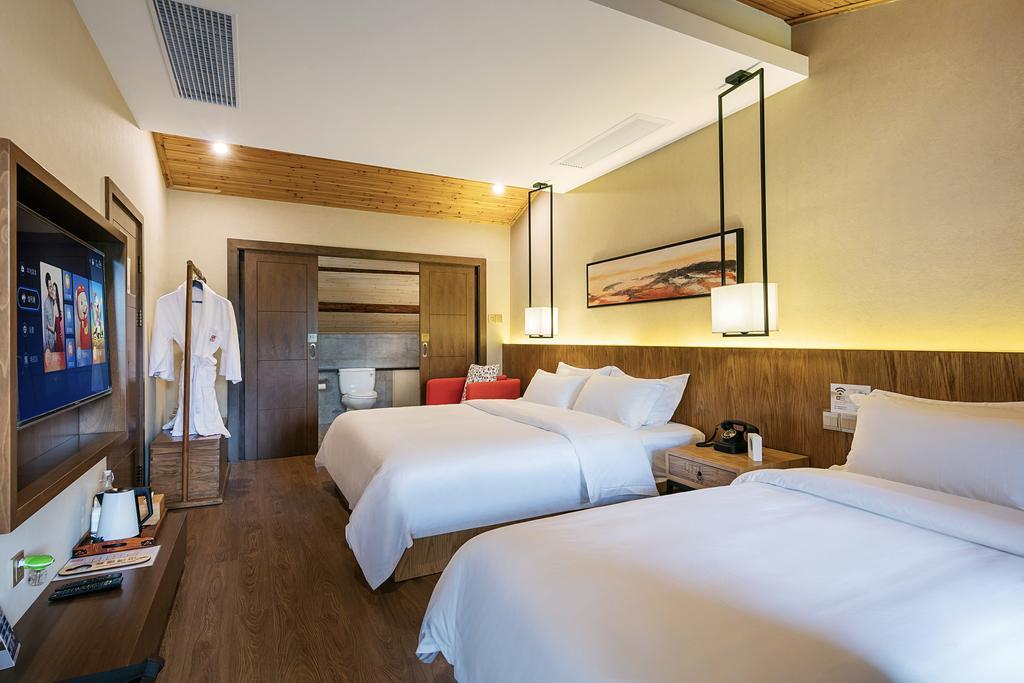 Hangzhou Puyu Travelling With Hotel Zewnętrze zdjęcie
