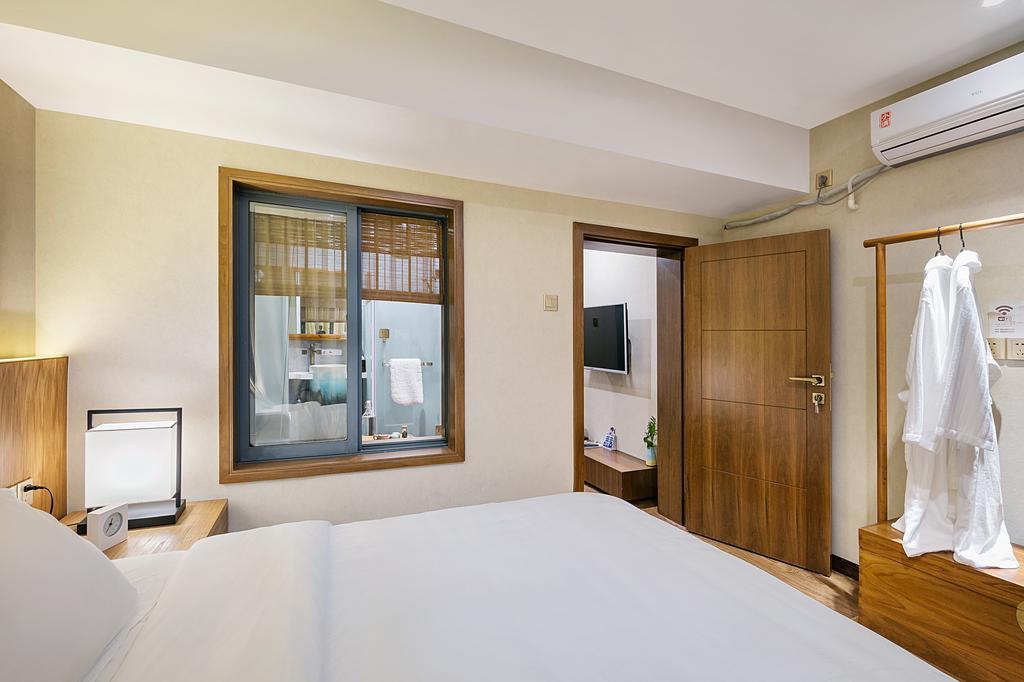 Hangzhou Puyu Travelling With Hotel Zewnętrze zdjęcie